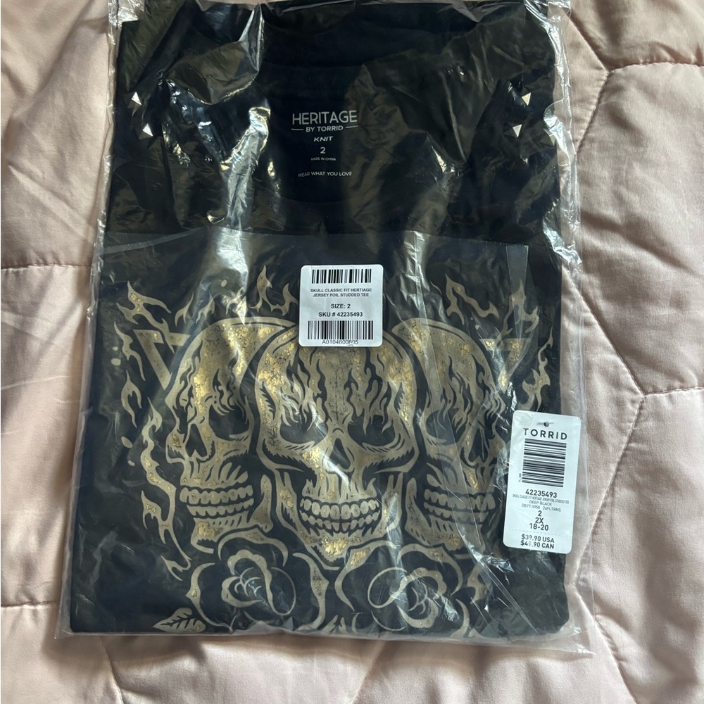 Torrid Black Tee with Gold Skull Design
